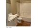 Full bathroom featuring tile floor, single sink vanity, and a shower over tub at 14930 N Gil Balcome Ct, Surprise, AZ 85379