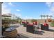 A cozy backyard with a stylish patio, comfortable seating, and a tranquil water feature, perfect for relaxation at 16712 S 175Th Ln, Goodyear, AZ 85338