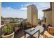 Charming outdoor patio space with comfortable seating and picturesque neighborhood views at 16712 S 175Th Ln, Goodyear, AZ 85338