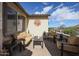 Inviting outdoor patio featuring comfortable furniture, lush plants, and serene views at 16712 S 175Th Ln, Goodyear, AZ 85338