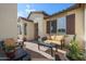 Cozy outdoor patio with comfortable seating, perfect for relaxing or entertaining guests at 16712 S 175Th Ln, Goodyear, AZ 85338