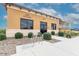 Exterior shot of the Art Studio building with manicured landscaping and modern architectural design at 17662 W Cedarwood Ln, Goodyear, AZ 85338