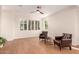 Inviting living area featuring hardwood floors, comfortable seating, and natural light at 2012 W Lawrence Rd, Phoenix, AZ 85015