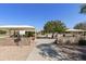 Community playground area with shaded picnic benches and play equipment for children at 41201 N Stenson Dr, San Tan Valley, AZ 85140