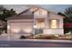 Charming single-story home with a two-car garage and desert landscaping, perfect for curb appeal at 41905 W Hospitality Ln, Maricopa, AZ 85138