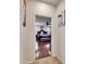 Hallway view of main bedroom featuring hardwood floors and ceiling fan at 5255 W Cochise Dr, Glendale, AZ 85302