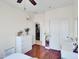 A bedroom with a view to a full bathroom and the laundry room at 5255 W Cochise Dr, Glendale, AZ 85302