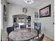 Open dining area adjacent to the kitchen and living spaces with view to backyard at 5255 W Cochise Dr, Glendale, AZ 85302