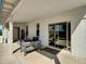 Covered patio with outdoor seating and a sliding glass door entry at 5255 W Cochise Dr, Glendale, AZ 85302