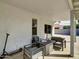 Covered patio featuring modern outdoor furniture and smooth concrete flooring at 5255 W Cochise Dr, Glendale, AZ 85302