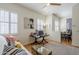 Bedroom or office featuring plantation shutters, ceiling fan, hardwood floors, and neutral decor at 615 E Portland St # 160, Phoenix, AZ 85004