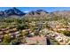 Expansive aerial view showcasing community amenities including pools, tennis courts and meticulously landscaped grounds at 6229 N 30Th Way, Phoenix, AZ 85016
