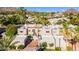 Beautiful Southwestern townhomes with neutral color palettes and desert landscaping against a mountain backdrop at 6229 N 30Th Way, Phoenix, AZ 85016