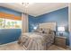 Bedroom with a large window overlooking a beautiful view and two bedside tables at 6229 N 30Th Way, Phoenix, AZ 85016