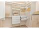 Walk-in closet with custom shelving, drawers, and ample storage space at 6229 N 30Th Way, Phoenix, AZ 85016
