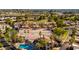 View of meticulously maintained community amenities, including tennis courts and pool in a lush, verdant environment at 6229 N 30Th Way, Phoenix, AZ 85016