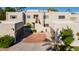 A modern, multi-unit home featuring a private garage, desert landscaping, and a beautifully designed exterior at 6229 N 30Th Way, Phoenix, AZ 85016