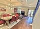 Bright open-concept living and dining area with hardwood floors and natural light at 6229 N 30Th Way, Phoenix, AZ 85016