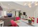 Inviting living area featuring modern decor, a striking blue fireplace, and seamless access to the outdoor patio at 6229 N 30Th Way, Phoenix, AZ 85016
