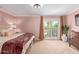 Light-filled bedroom with balcony access, perfect for relaxation at 6229 N 30Th Way, Phoenix, AZ 85016