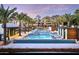 Resort-style pool area surrounded by lush landscaping and comfortable lounge chairs with mountain views at 6229 N 30Th Way, Phoenix, AZ 85016