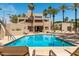 Beautiful community pool and lounge area with comfortable seating and plenty of space for relaxing and enjoying the sun at 6229 N 30Th Way, Phoenix, AZ 85016