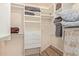 Spacious walk-in closet with built-in shelving, drawers, and ample storage for an organized wardrobe at 6229 N 30Th Way, Phoenix, AZ 85016