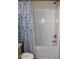 Bathroom featuring a tub/shower combo with patterned curtain at 7807 E Main St # F24, Mesa, AZ 85207
