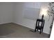 Bedroom featuring a neutral color scheme, blinds and accent table at 7807 E Main St # F24, Mesa, AZ 85207