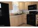 Eat-in kitchen features modern appliances and countertops at 7807 E Main St # F24, Mesa, AZ 85207