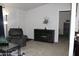 Inviting living room features a cozy armchair and stylish decor at 7807 E Main St # F24, Mesa, AZ 85207