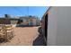 View of the backyard featuring solar panels, a shed, and a fenced-in area at 1116 E 11Th E St, Casa Grande, AZ 85122