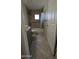 Bathroom with tile flooring, tile shower and grey vanity at 1116 E 11Th E St, Casa Grande, AZ 85122