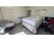 Bedroom with light walls, wood laminate flooring, and walk-in closet at 1116 E 11Th E St, Casa Grande, AZ 85122