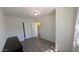 Bedroom with light walls, closet, and wood laminate flooring at 1116 E 11Th E St, Casa Grande, AZ 85122