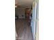 Welcoming entryway with wood-look floors, leading into the cozy living spaces and kitchen at 1116 E 11Th E St, Casa Grande, AZ 85122