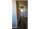 Hallway features updated flooring and fresh paint at 1116 E 11Th E St, Casa Grande, AZ 85122