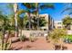 A community sign surrounded by palm trees and desert landscaping at 11260 N 92Nd St # 2058, Scottsdale, AZ 85260