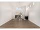 Bright, spacious living room with hard surface floors, fireplace, fan and balcony access at 11260 N 92Nd St # 2058, Scottsdale, AZ 85260