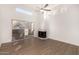 Bright, spacious living room with hard surface floors, fireplace and balcony access at 11260 N 92Nd St # 2058, Scottsdale, AZ 85260