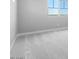 Neutral bedroom boasts plush carpeting, recessed lights, and a multitude of windows at 12219 W Caraveo Pl, Peoria, AZ 85383