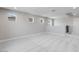 The bonus room features neutral paint, soft carpet and natural light at 12219 W Caraveo Pl, Peoria, AZ 85383