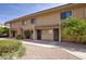 Inviting townhome exterior with well-kept landscaping and charming curb appeal on a sunny day at 12627 N La Montana Dr # 104, Fountain Hills, AZ 85268