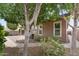 Landscaped backyard featuring a covered patio, lush landscaping, and hardscape at 13110 W Avenida Del Rey --, Peoria, AZ 85383