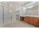 Primary bathroom features a walk-in shower, double sink vanity, and walk-in closet at 13110 W Avenida Del Rey --, Peoria, AZ 85383
