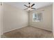 Bright bedroom features neutral walls, carpeted floors, ceiling fan and sunny window at 13110 W Avenida Del Rey --, Peoria, AZ 85383