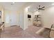 Inviting entryway featuring neutral tones, tile flooring, and convenient coat closet for optimal functionality at 13110 W Avenida Del Rey --, Peoria, AZ 85383