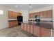 Close-up of kitchen island with a black appliance package and ample storage at 13110 W Avenida Del Rey --, Peoria, AZ 85383