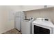 Laundry area equipped with washer, dryer, and utility sink at 13110 W Avenida Del Rey --, Peoria, AZ 85383