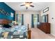 Main bedroom features a wood dresser, decorative furnishings, and windows that provide plenty of natural light at 13110 W Avenida Del Rey --, Peoria, AZ 85383
